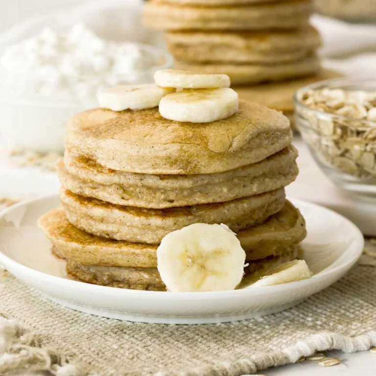 How to make the BEST light & fluffy cottage cheese pancakes gluten-free with oat flour in a blender. Naturally sweetened w/ maple syrup.