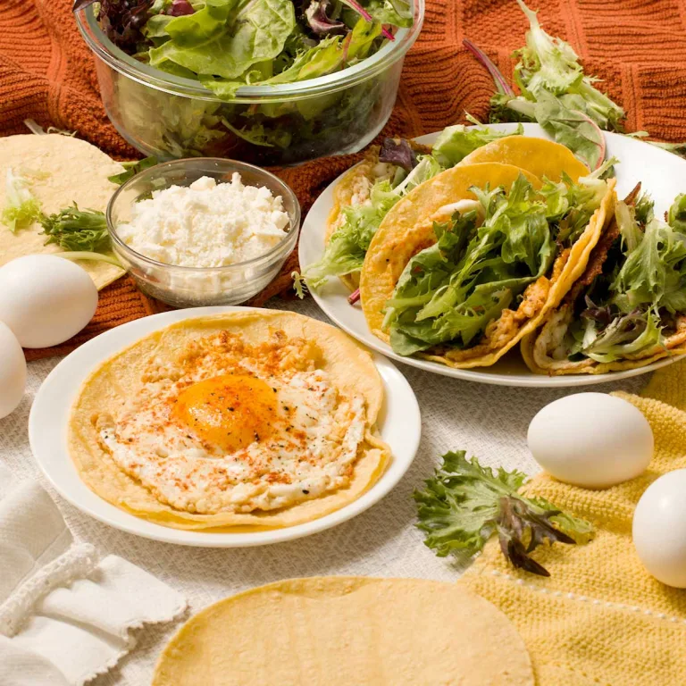 How to make the BEST & EASY feta fried eggs in a corn tortilla taco. They're crispy, cheesy, & become a fresh salad filled w/ leafy greens!