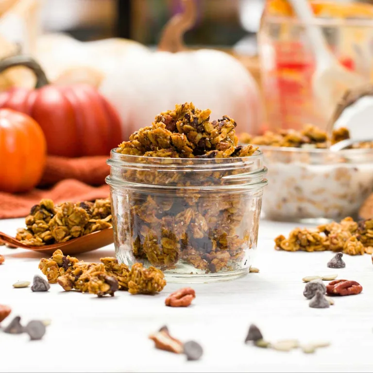 Gluten-free pumpkin chocolate chip granola in a glass mason jar.