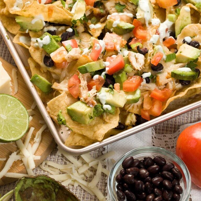 Healthy Gluten-Free Chicken Nachos in a sheet pan.