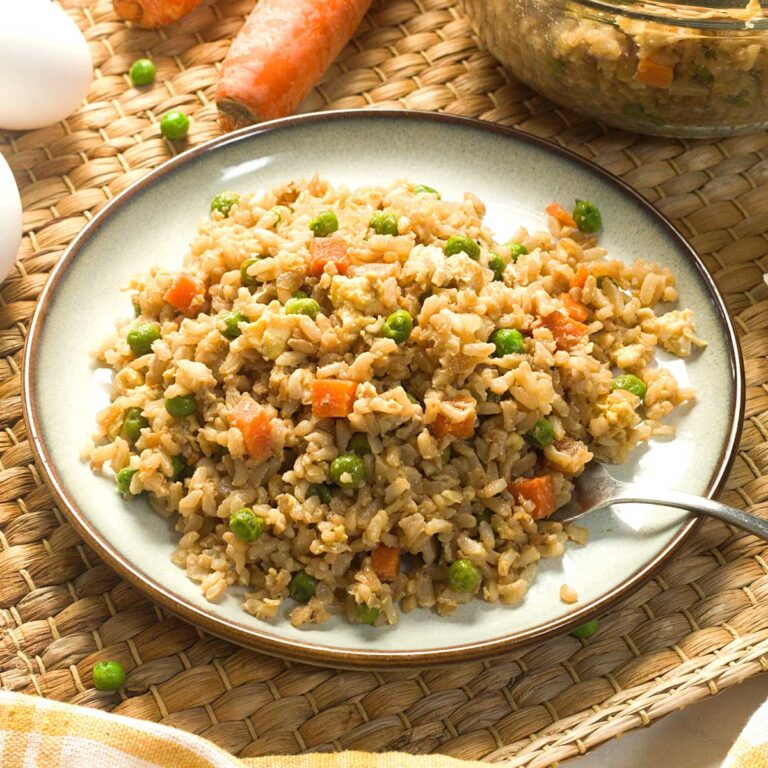 Healthy Gluten-Free Brown Fried Rice with Egg on a plate.