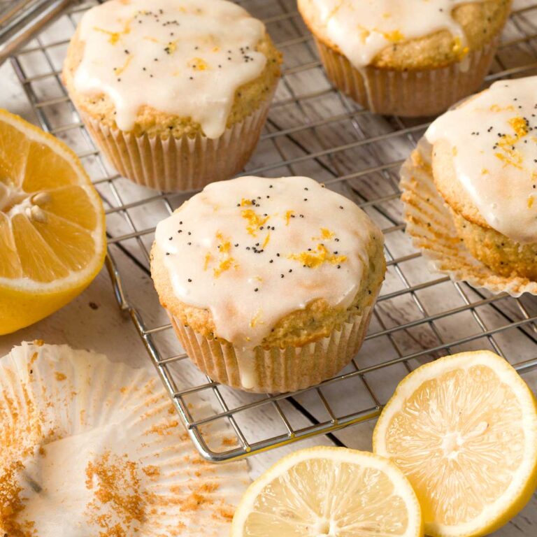 Gluten-Free Lemon Poppyseed Muffins with Almond Flour on a cooling rack.