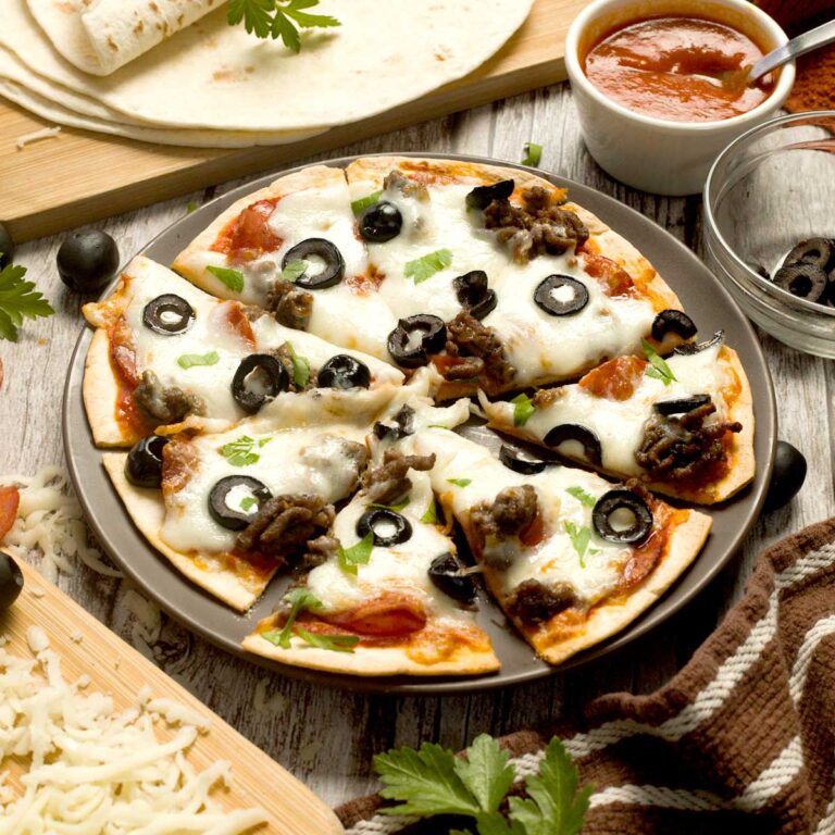 Air Fryer Tortilla Pizza on a plate.