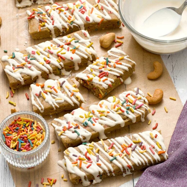 A batch of gluten-free birthday cake protein bars with sprinkles.