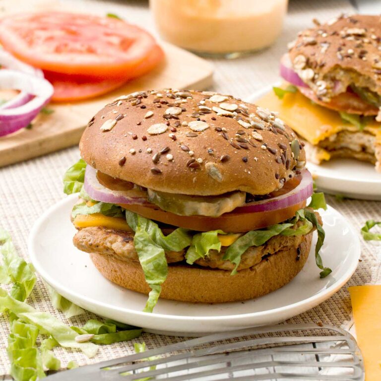 Hey juicy Turkey smash burger with special sauce and pickles, tomatoes, lettuce, and cheese.