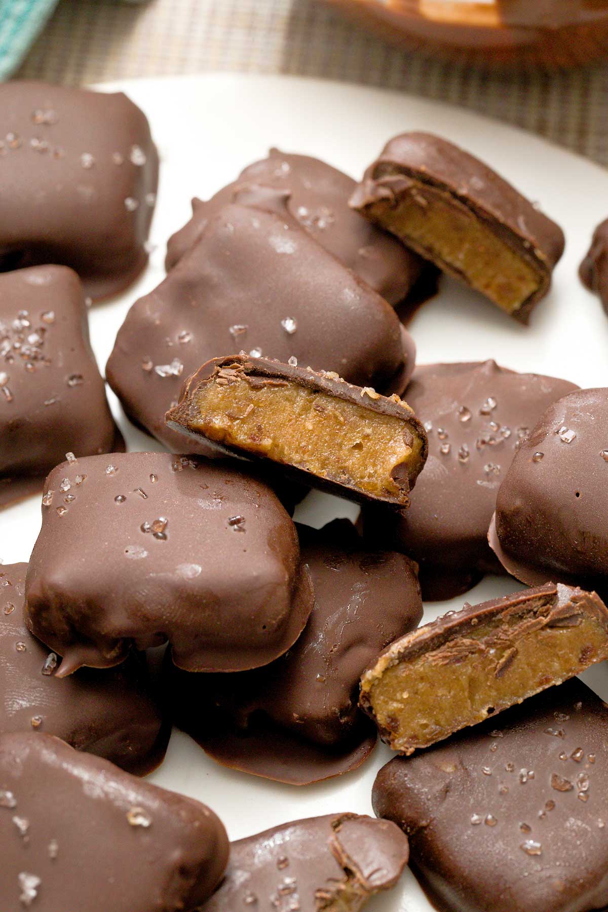 Chocolate covered date caramels with sea salt on top.