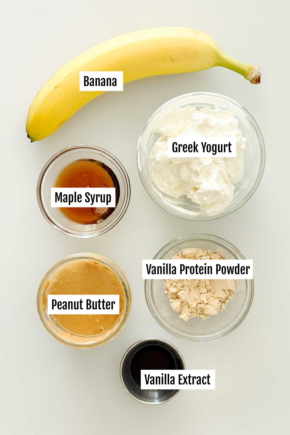 All the ingredients you need to make peanut butter Greek yogurt protein bowl with chocolate chips.