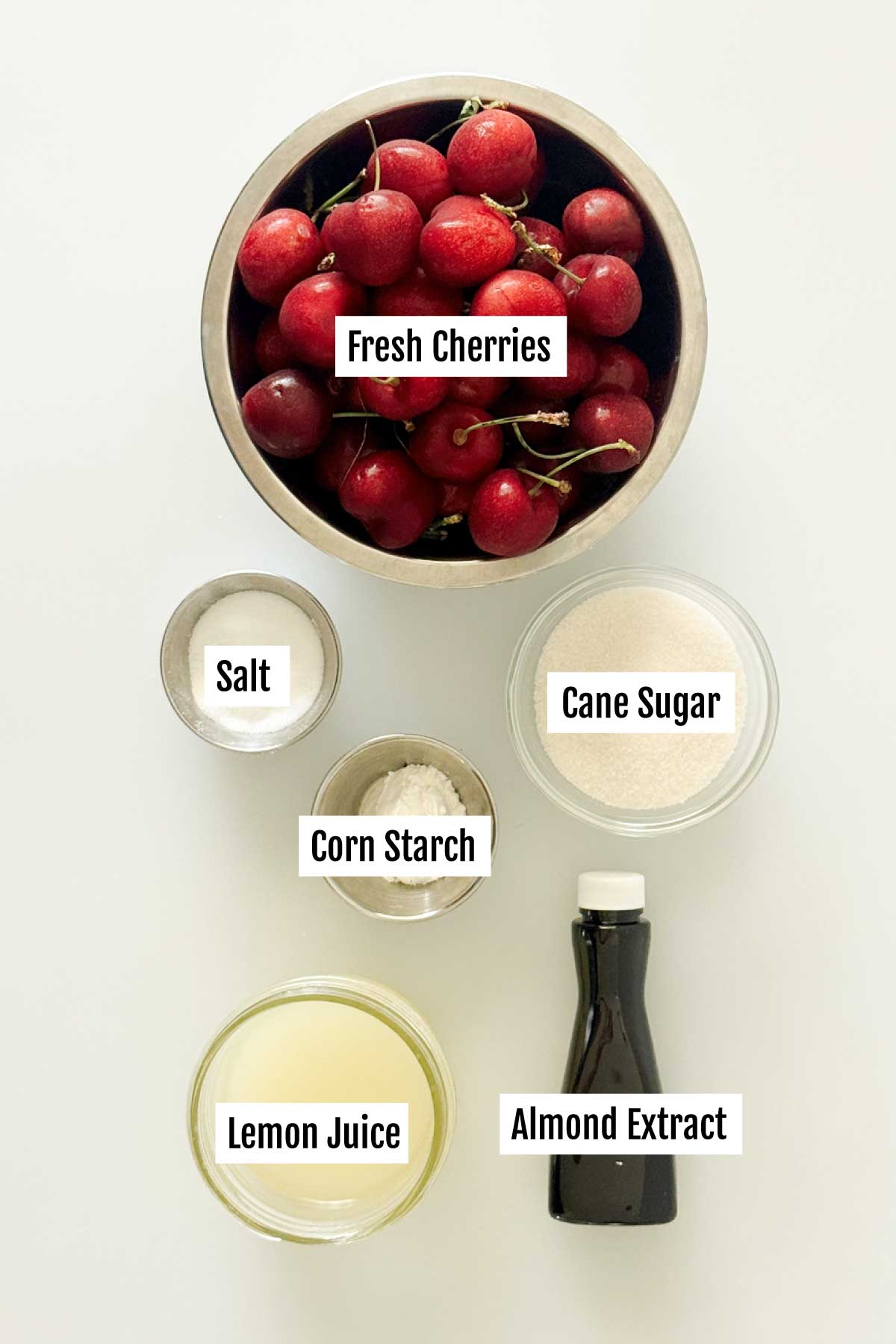 All the ingredients you need to make a cherry compote dessert sauce.