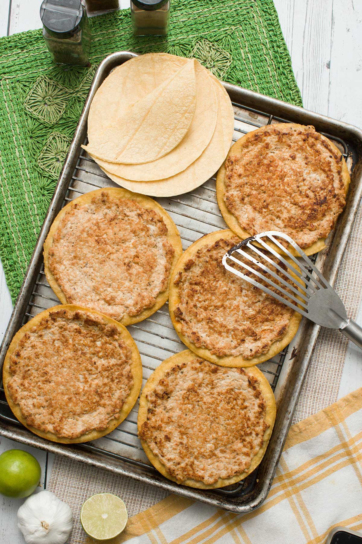 The chicken smash tacos on a cooling rack.