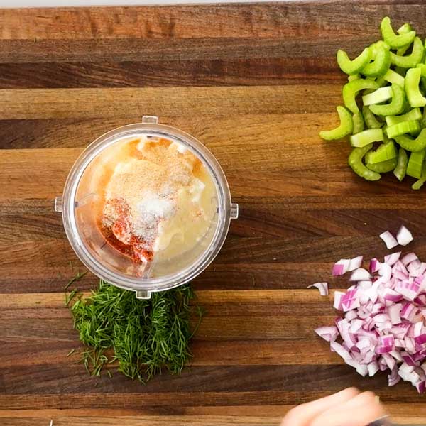 Adding the cottage cheese and all the wet ingredients and seasonings in a blender cup.