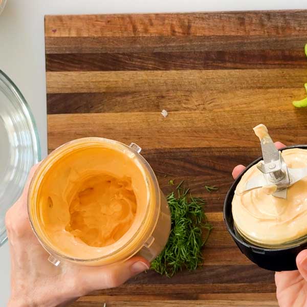 The cottage cheese and wet ingredients blended smooth in a blender cup.