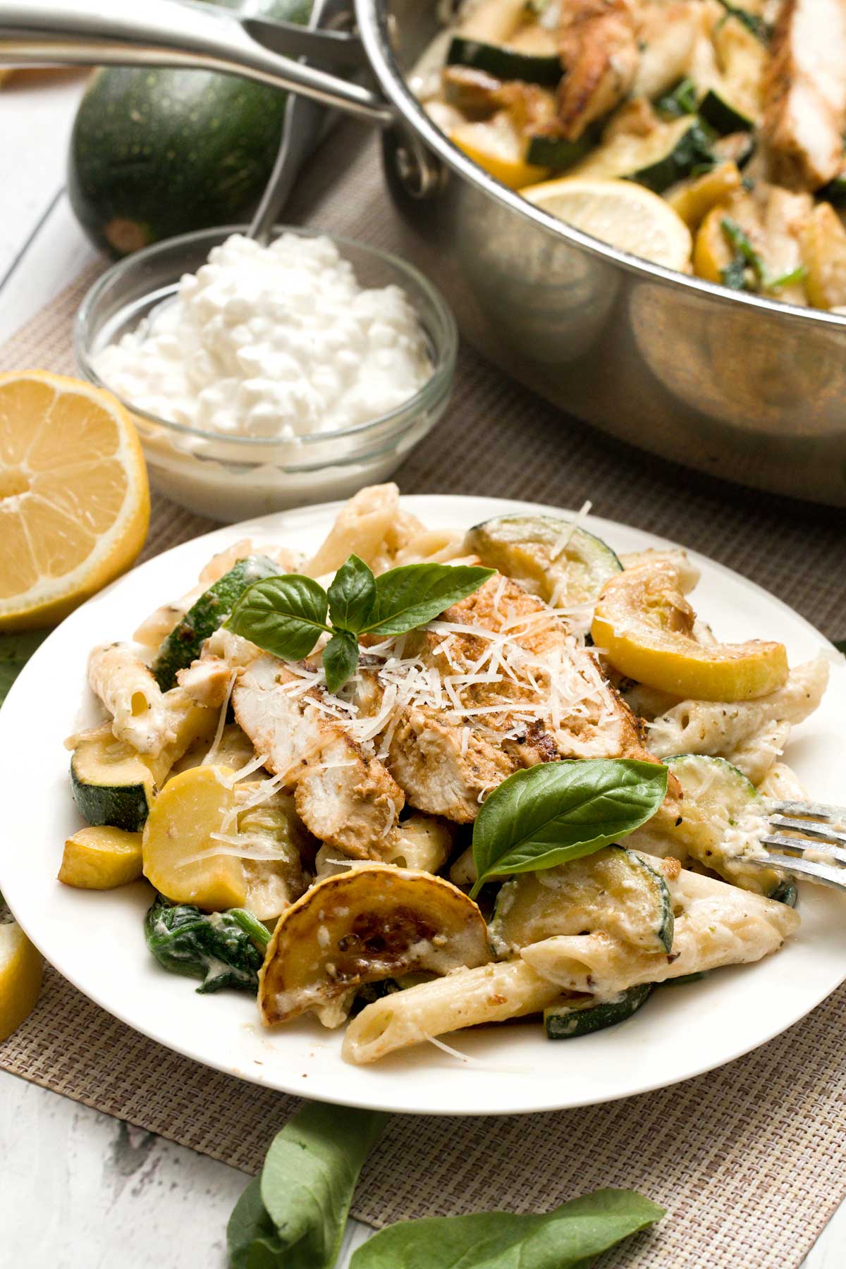 A plate with cottage cheese lemon zucchini pasta