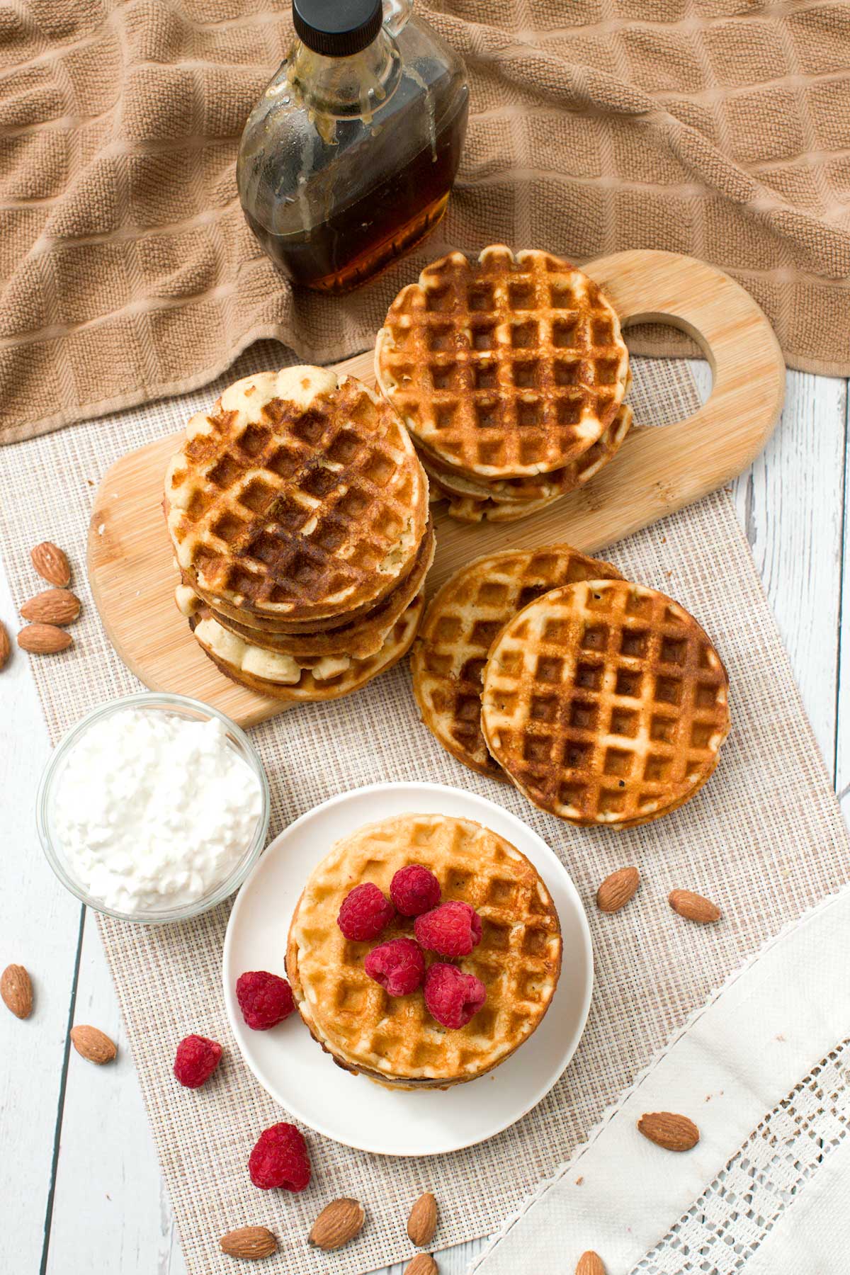 Cottage cheese, almond flour waffles on a cutting board.