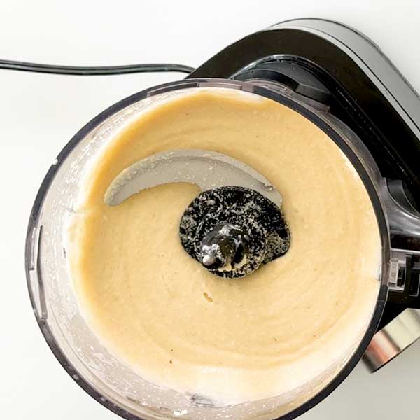 The smooth blended batter in the food processor.
