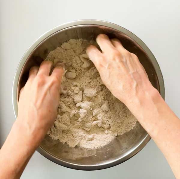 Holding in the butter by hand.