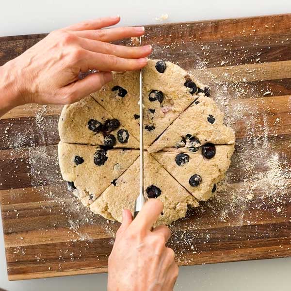 Slicing the scone batter into eight wedges.