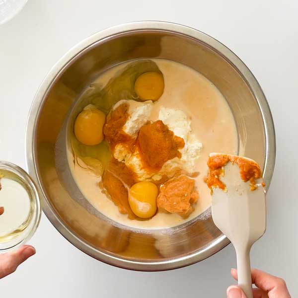 Adding all the wet ingredients to the batter.