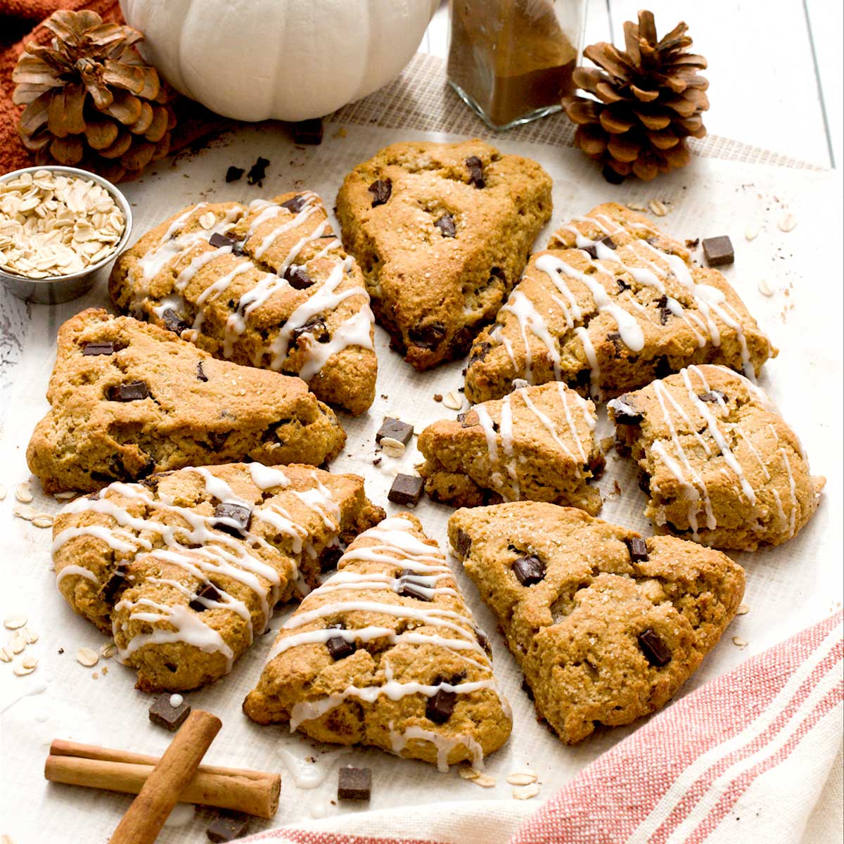 Pumpkin cottage cheese scones in a circle on parchment paper.