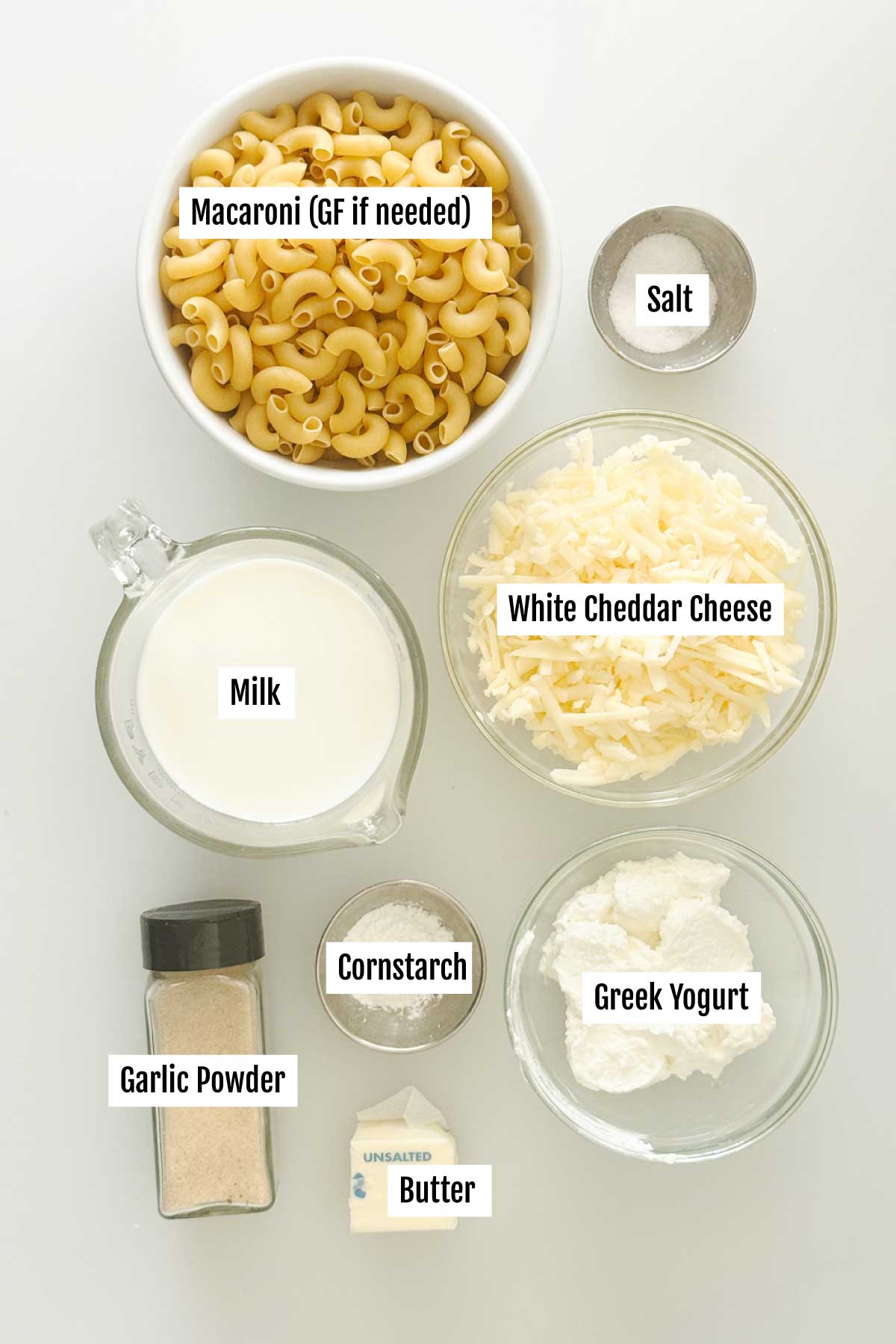 All the ingredients you need to make white cheddar mac and cheese with greek yogurt.