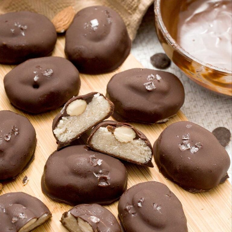 A batch of dairy-free almond joy candy bars with sea salt on top.