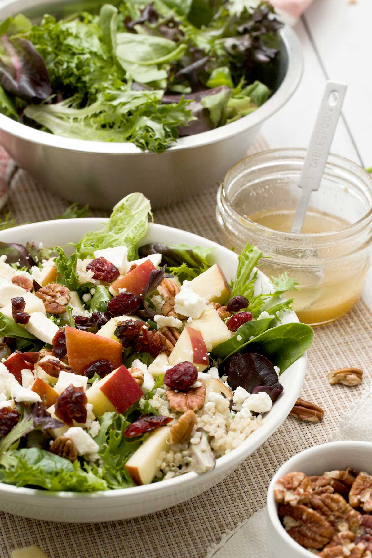 An apple quinoa cranberry salad with feta, pecans & tangy apple cider dressing