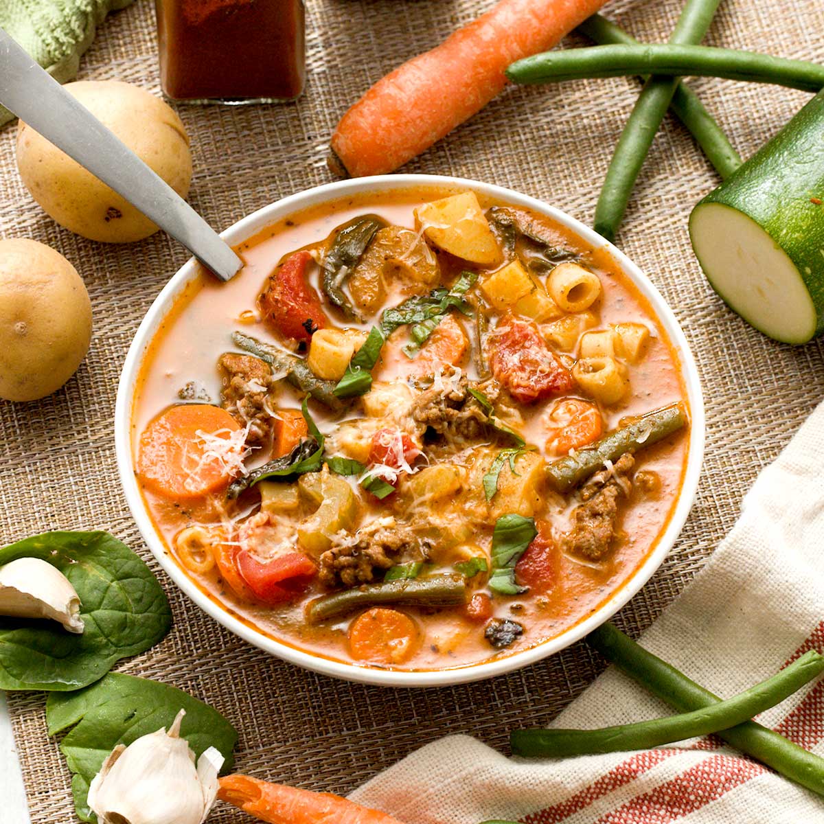 Ground beef minestrone soup without beans in a bowl.