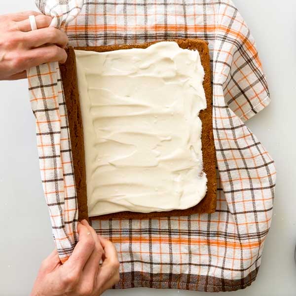 Rolling up the filled roll in a towel.