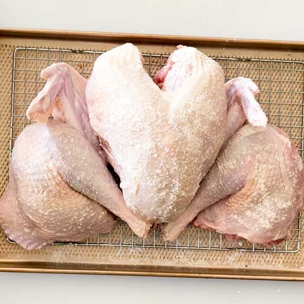 The dry brined turkey going into the fridge overnight.