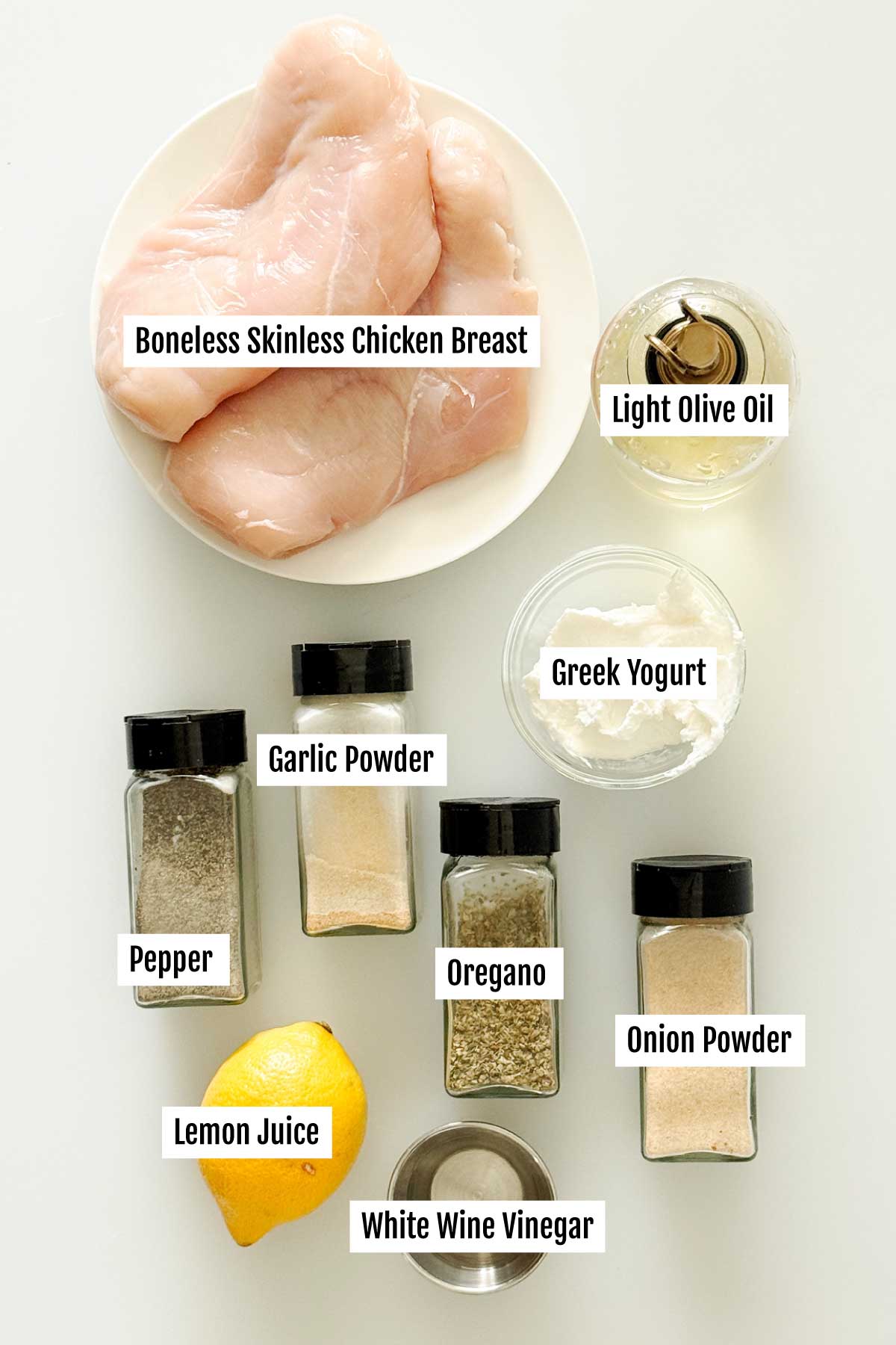All the ingredients you need to make greek yogurt marinated chicken breast.